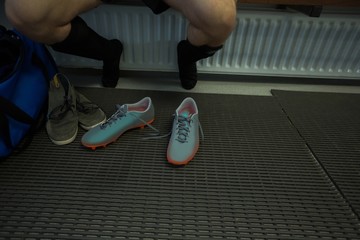 Player relaxing in changing room