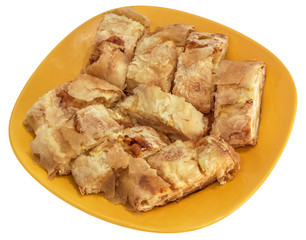 Serbian Traditional Cheese Roll Pie Gibanica Slices Offered On Yellow Ceramic Plate Isolated On White Background