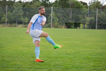 Soccer player playing football