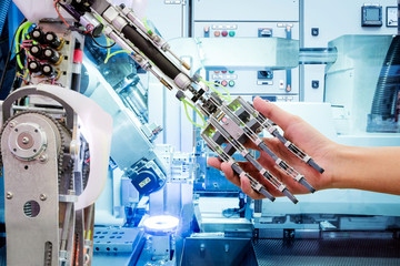 Close up AI robot handshake with human