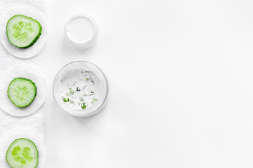 Cucumber moisturising cream or mask pattern. White background top view copyspace