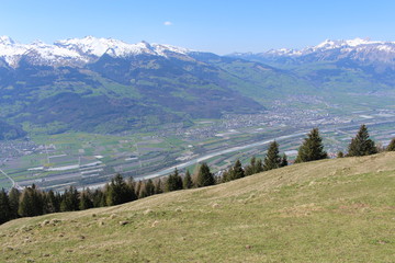 Fototapeta na wymiar Aerial view of Liechtenstein (Upper Rhine valley), taken from the Alpspitz peak in Gaflei village in the municipality of Triesenberg.