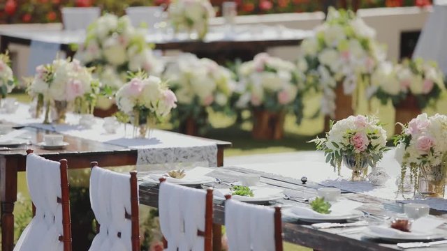 wedding reception decoration in white colours outdoors on resort hyatt,maui,hawaii