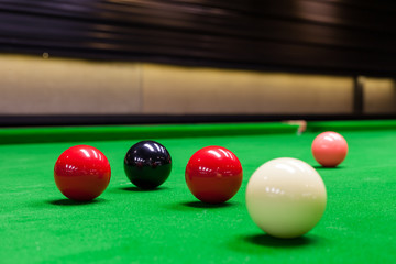 Snooker balls on the table at snooker club.