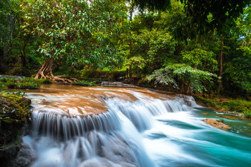 Than sawan Waterfall, Payao, Thailand, Long explosure shot, Beautiful green waterfall in the nature at sunset.