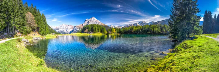 Wall murals Alps Arnisee with Swiss Alps. Arnisee is a reservoir in the Canton of Uri, Switzerland.
