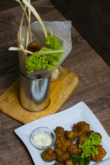 chicken nuggets with salad and cheese sticks