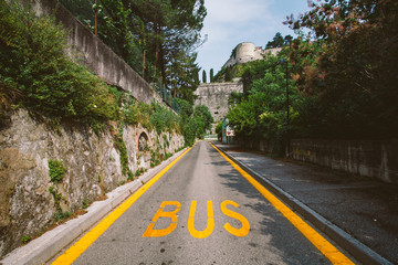 The bus for public transport of a yellow bus in Italy, Lombardy