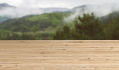 Wooden Table Closeup With Blurred Mountains And Clouds In The Background 3D Rendering