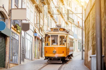 Fotobehang Street view with famous retro tourist tram in the old town of Porto city, Portugal © rh2010