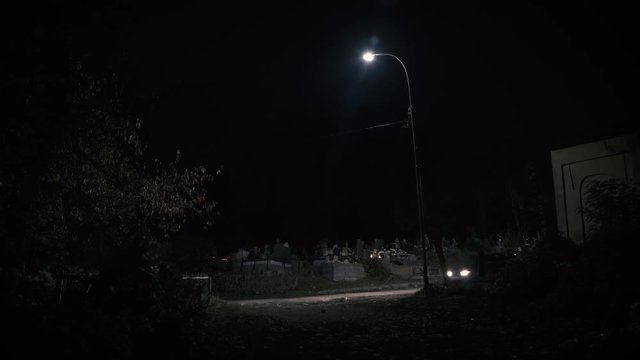 Dark night near the cemetery on the day of all the dead