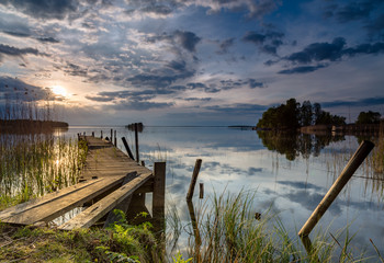 Jetty in summer at sunset
