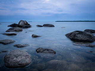 Fototapeta na wymiar Rocks at lake
