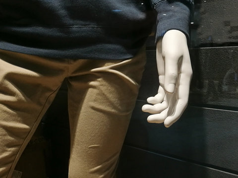 Left hand ready to shake from cloth model standing