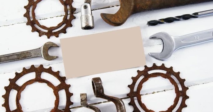 Worktools and blank paper on wooden plank 