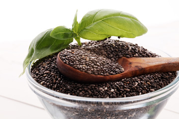 Healthy Chia seeds in a glass bowl on the table