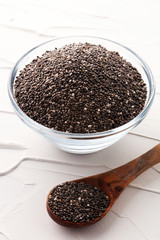 Healthy Chia seeds in a glass bowl on the table
