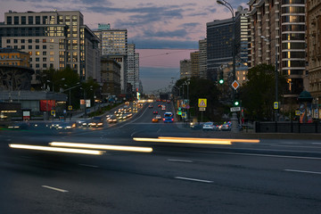 Blurred motion of city traffic at dusk