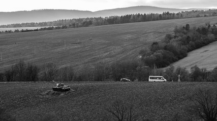 world war II tanks on a field as a battle monument