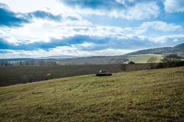 world war II tanks on a field as a battle monument