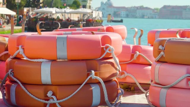 14622_Orange_bouys_piled_on_the_boat_in_Zattere_port.mov