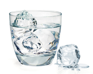 Glass of water with ice on white background