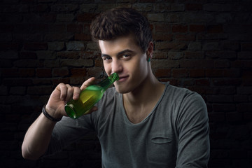 Handsome guy having a beer
