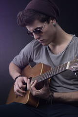 Young guitarist performing