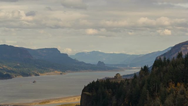 Ultra high definition video time lapse of moving clouds and sky over Vista House on Crown Point OR along Columbia River Gorge with Beacon Rock View in Washington State USA 4k