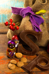 Traditional Dutch Saint Nicolas celebration with presents for children in December, Saint Nicolas  gift bag and chocolate letters