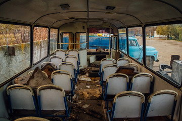 Inside old abandoned rusty broken soviet bus