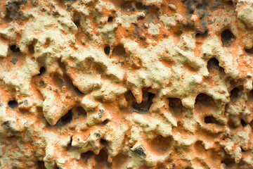 Abstraction orange texture concrete wall close