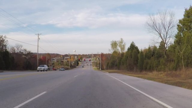 Branson MO,USA - November 10, 2017. POV. point view of autumn colors on a Branson road. Driving. Scenic view from car.