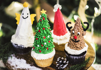 Set of cute Christmas cupcakes