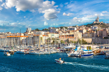 Fototapeta premium Notre Dame de la Garde and olf port in Marseille, France