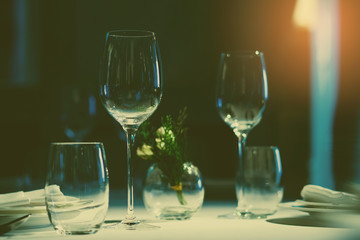 Empty glasses wine in restaurant. Glass water. Dish spoon fork on table