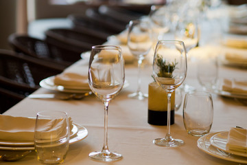 Empty glasses wine in restaurant. Glass water. Dish spoon fork on table