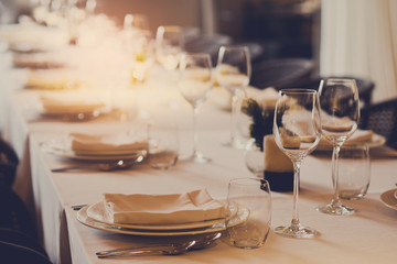 Empty glasses wine in restaurant. Glass water. Dish spoon fork on table