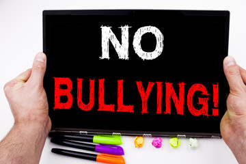 No Bullying text written on tablet, computer in the office with marker, pen, stationery. Business...