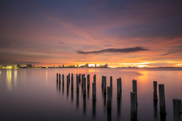 Old bridge at sunset in Djittabhawan temple, Chonburi, Thailand.