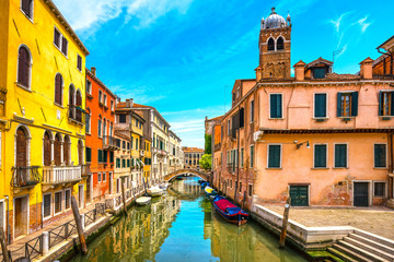 Venice cityscape, water canal, campanile church and traditional buildings. Italy