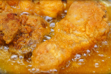 Close Up Chicken Frying In A Pan. Unhealthy Food Concept