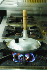 Pot of food boiling on gas stove