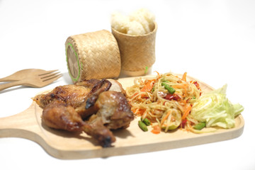 Papaya salad with sticky rice and grilled chicken
