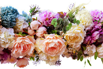 Decorative garland of artificial flowers - roses and hydrangeas. Isolated, white background.