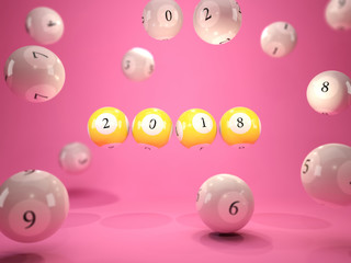 2018 New Year sign on lottery balls over pink background
