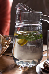 Decanter with water with lemon and mint