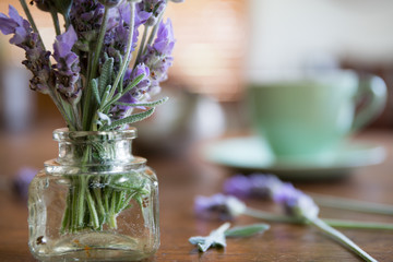 Lavender Flowers on wooden table top with blurred background