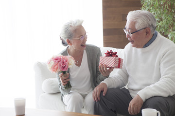 An old couple gives presents delightfully