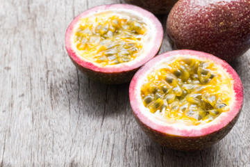 Closeup passion fruit on wooden background, fruit healthy concept